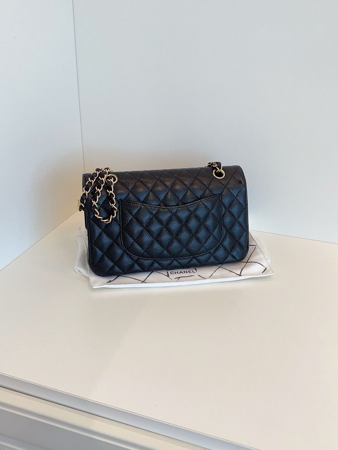Chanel classic flap CF medium black caviar leather bag year