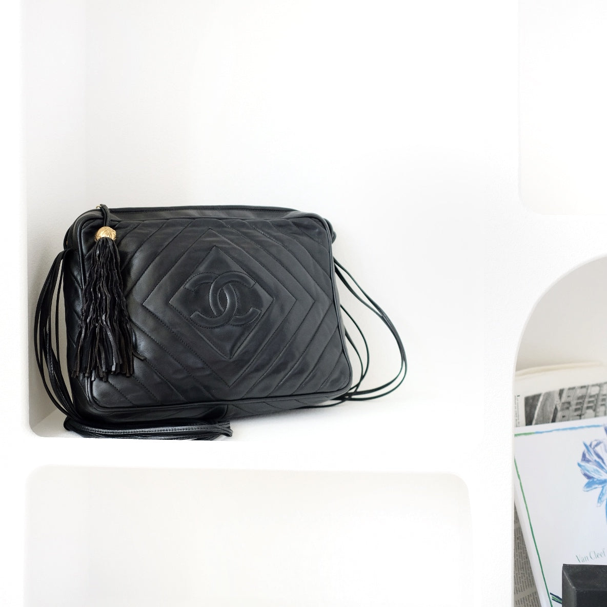 Chanel black quilted lambskin crossbody bag with tassel