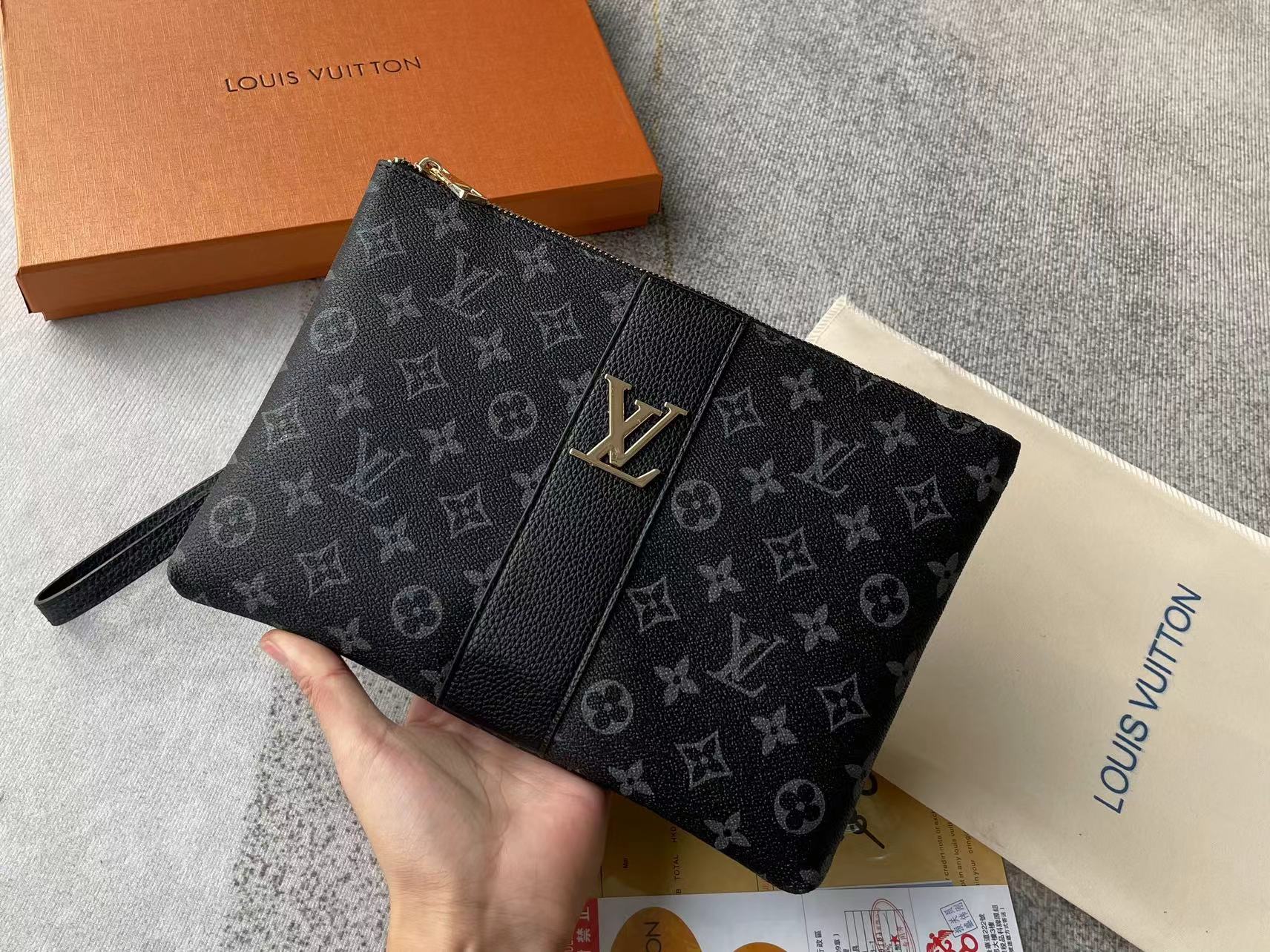 Louis vuitton handbag (wristlet   bag)
