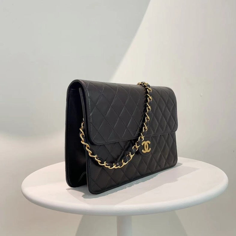 Chanel Classic Flap Bag Black Quilted Leather Medium Size Gold Hardware