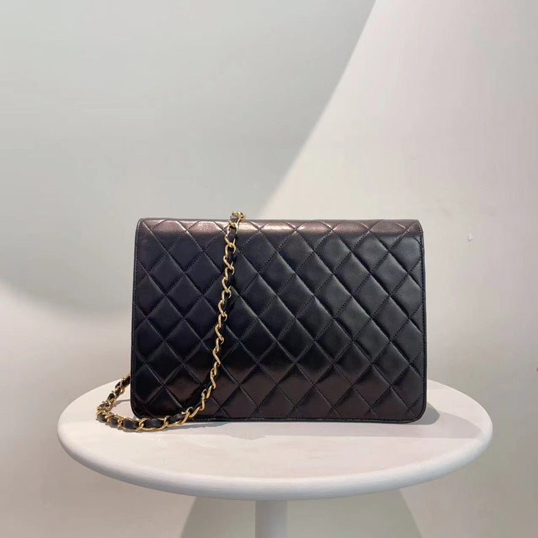 Chanel Classic Flap Bag Black Quilted Leather Medium Size Gold Hardware