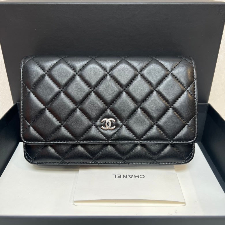 CHANEL Quilted Leather Black Clutch Bag