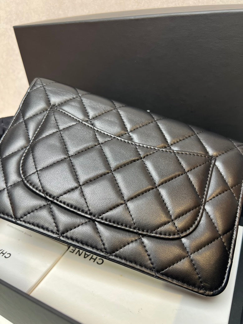 CHANEL Quilted Leather Black Clutch Bag