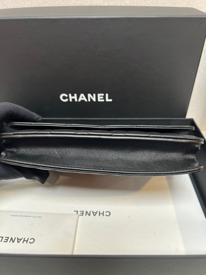 CHANEL Quilted Leather Black Clutch Bag