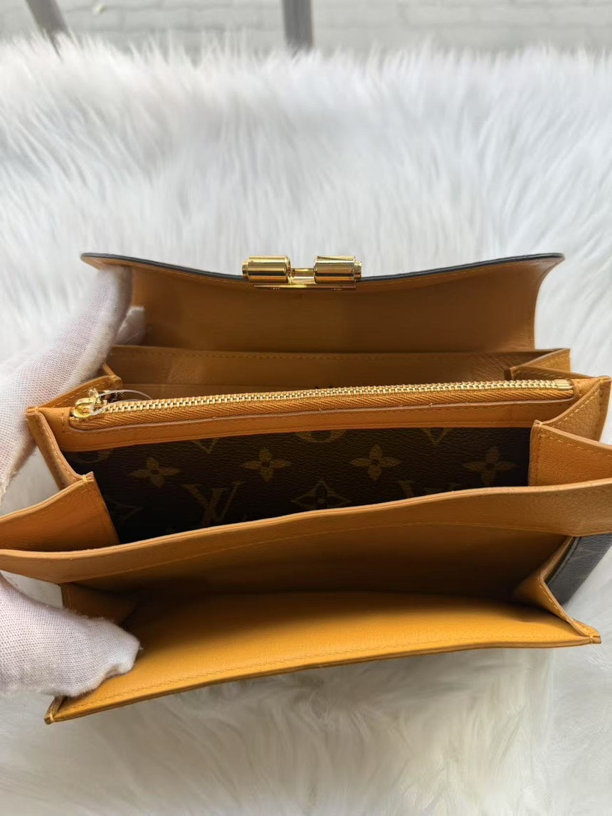 Louis Vuitton Monogram Canvas Elysee Wallet Brown