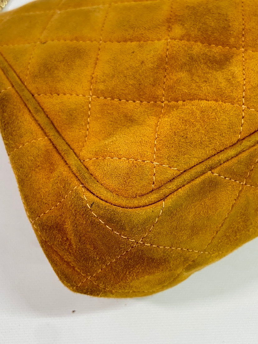CHANEL   Quilted Suede Chain Top Handle Bag Mustard