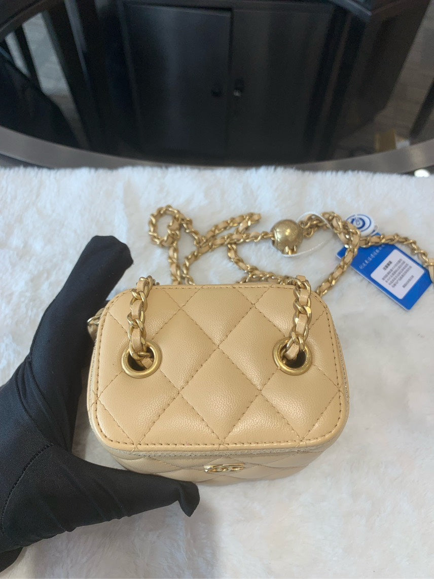 Chanel Preloved Quilted Beige Leather Mini HBG
