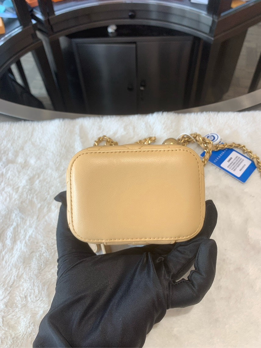 Chanel Preloved Quilted Beige Leather Mini HBG