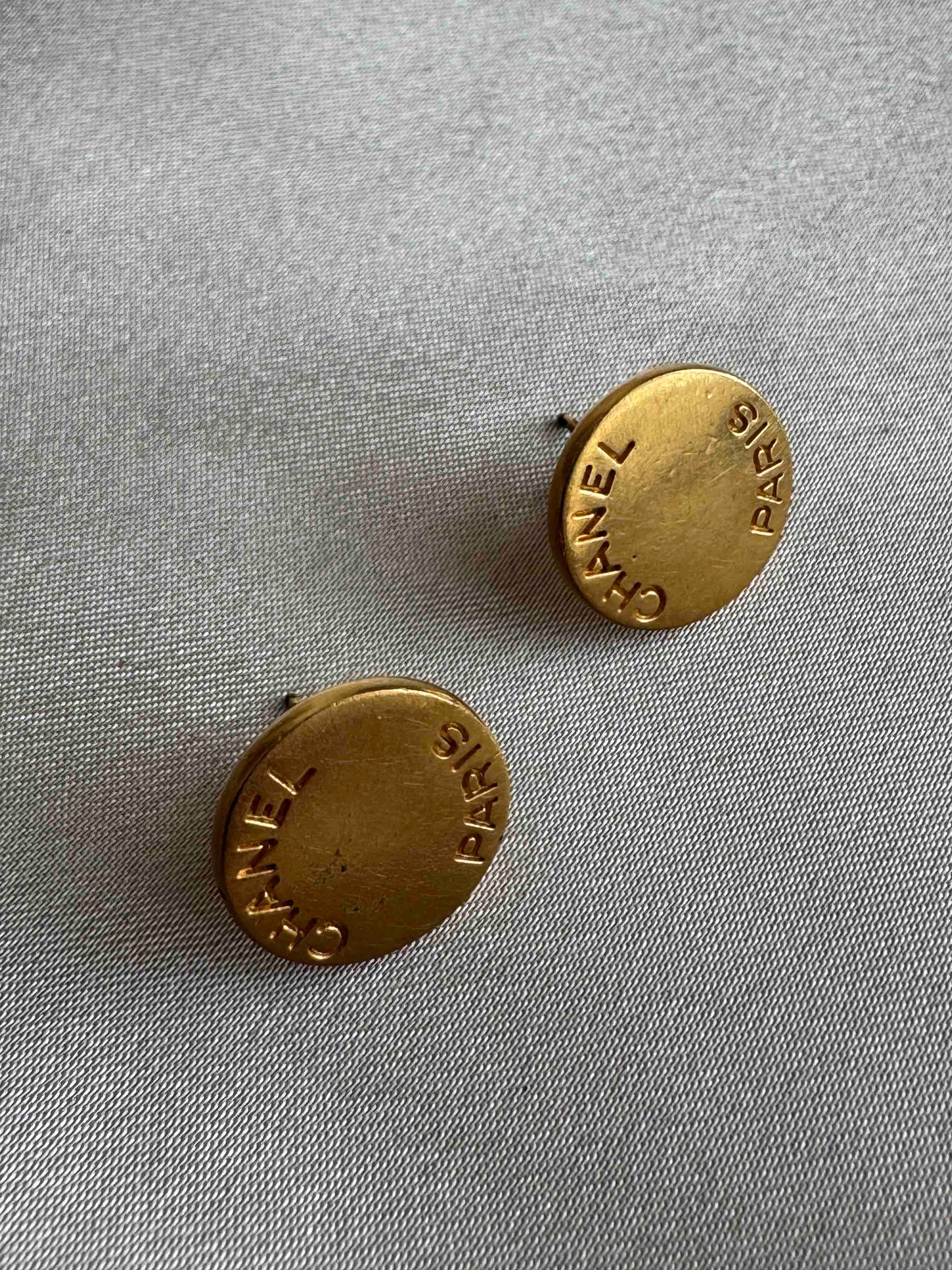 Chanel Paris Stud Earrings Gold Tone   RE91430900